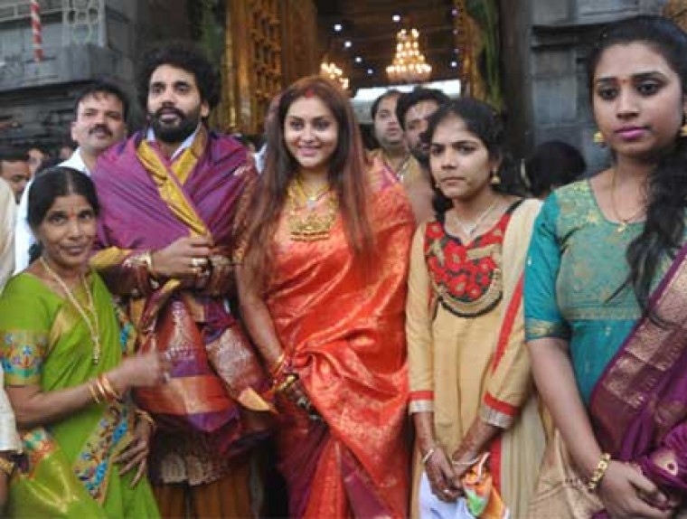 Actress Namitha Couple offers prayer at Tirumala Temple