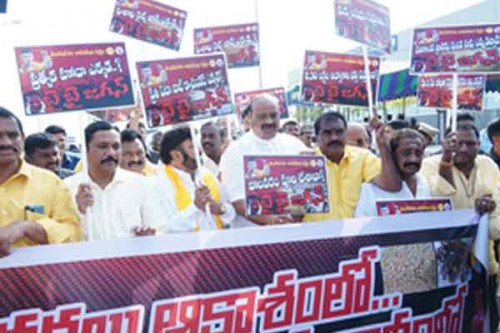 TDP MLAs march to Assembly with 'Bye Bye Jagan' slogan