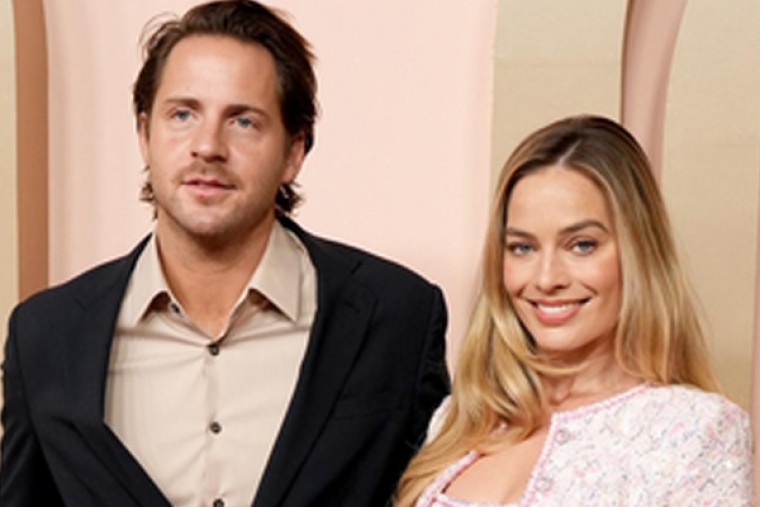 Margot Robbie's husband says he spends '24 hours a day' with the 'Barbie' star