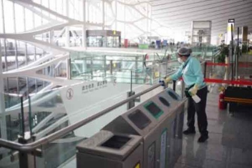 China opens air travel amid Covid surge, experts worried