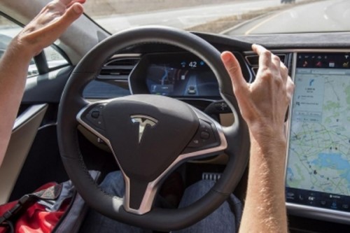 Tesla halts rollout of Full Self-Driving beta software amid recall
