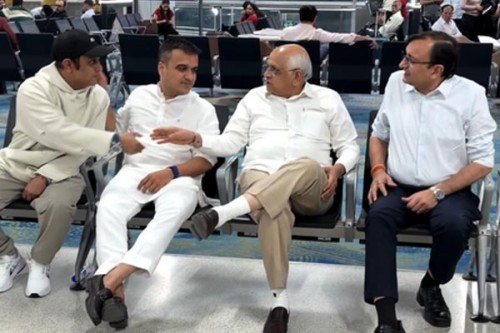 Gujarat CM, Deputy CM interact with people at Delhi airport