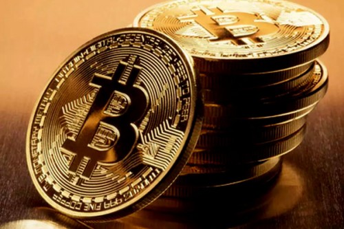 Bitcoin tumbles below $100,000 amid global market sell-off
