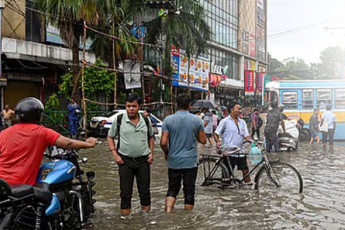 Kolkata Struggles With Waterlogging After Record Rainfall Kills 10