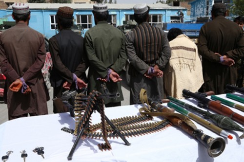 Afghan police find arms in car, arrest two suspects