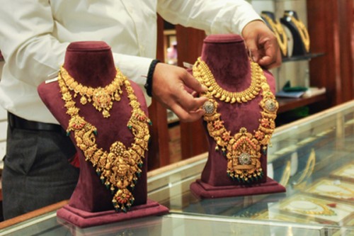 Gold, silver prices surge over global trade uncertainty, dollar dip