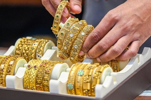 Gold, silver prices decline as stronger dollar weighs on demand