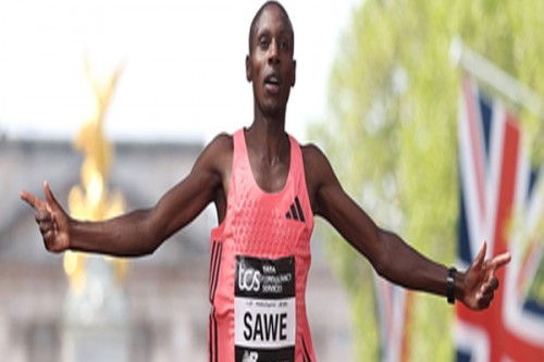 Athletics: Kenya's Sawe becomes first man to run a marathon under two hours