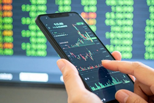 Sensex, Nifty trade flat in early deals amid weak global cues