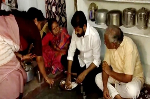 Telangana CM eats lunch with beneficiary family of fine rice scheme