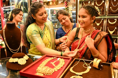 Gold prices jump over 4 pc to hit record high