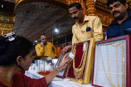 Gold, silver prices drop ahead of key US inflation data