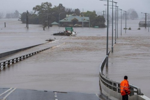 Tropical storm prompts life-threatening flash flooding warning in Australia