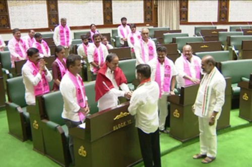 Amid bitter war of words, Revanth Reddy shakes hands with KCR