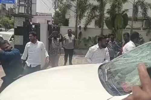 BJP Workers Storm BRS MLA Office in Karimnagar, Vehicle Damaged Amid Tension
